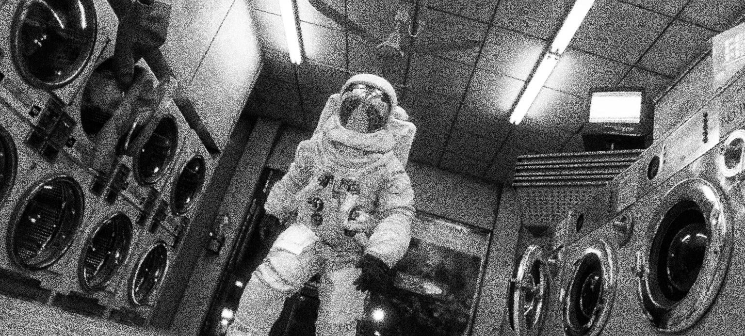 3D animation by PES Motion Studio: astronaut standing in a dimly lit corridor